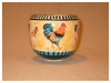 A Bali stoneware jardiniere, decorated with cockerel and hen design - first view.